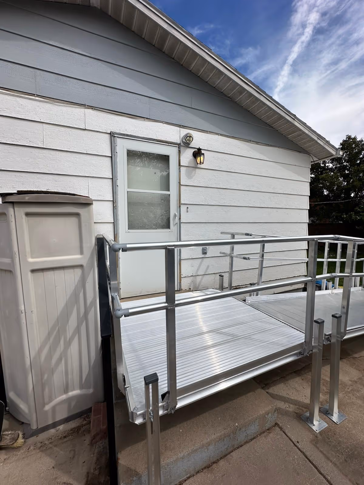 Wheelchair ramp platforms configured to fit a residential entryway